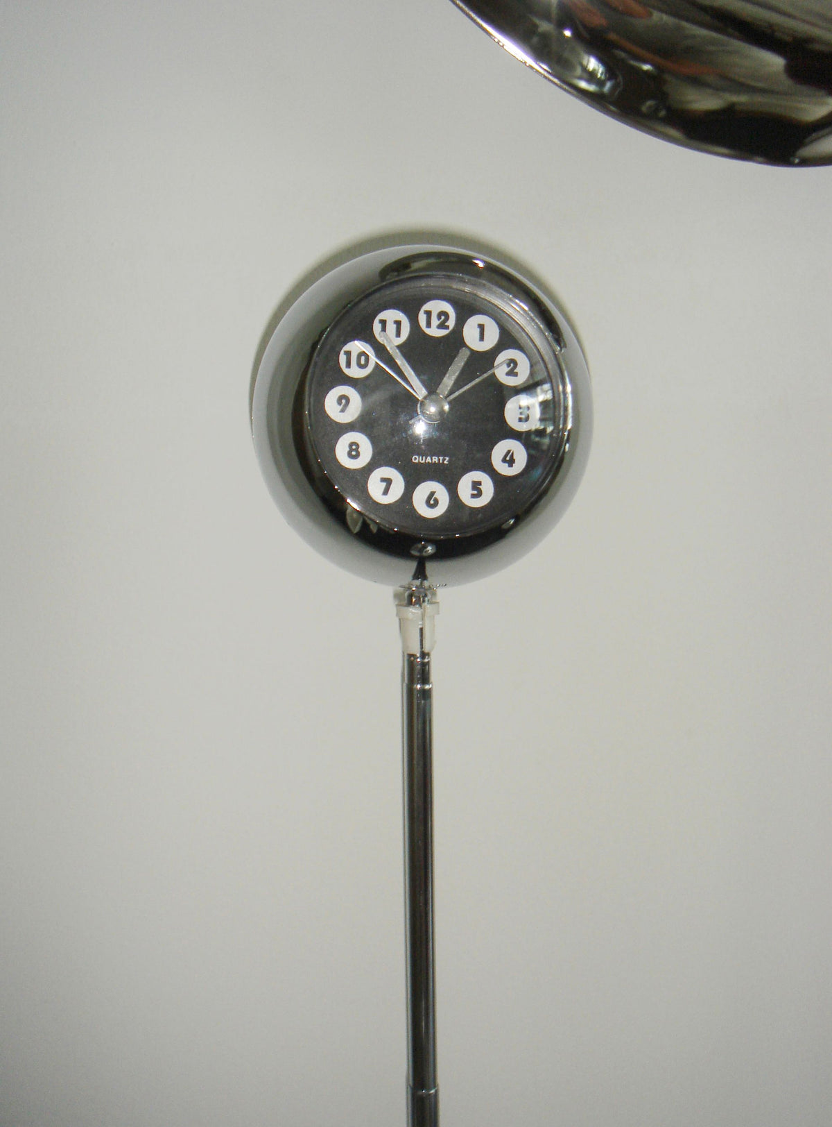 The Black Kikkerland Space Age Clock